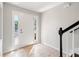 Bright foyer featuring tile floors, a staircase, and a door with sidelights at 10144 Arbor Run Dr # 139, Tampa, FL 33647