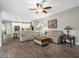 Bright, open concept with hardwood floors and connected open-concept kitchen at 10213 Lockwood Pines Ln, Tampa, FL 33635