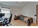 Bedroom space with natural lighting, complete with wood floors at 1040 Summer Breeze Dr, Brandon, FL 33511