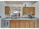 Spacious kitchen offering granite countertops, stainless steel appliances, and wooden cabinetry, perfect for cooking and entertaining at 1040 Summer Breeze Dr, Brandon, FL 33511