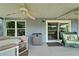 Outdoor porch with comfortable seating, ceiling fans, and natural light at 1040 Summer Breeze Dr, Brandon, FL 33511