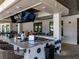 Community bar with stools and televisions at 10446 Tupper Cay Dr, San Antonio, FL 33576