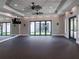 Bright gym featuring mirrored walls, modern exercise equipment, and ample space for fitness activities at 10446 Tupper Cay Dr, San Antonio, FL 33576