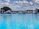 Fun water park with inflatable slides, climbing structures, and other attractions on a sunny day at 10446 Tupper Cay Dr, San Antonio, FL 33576