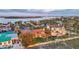 Lovely coastal properties with lush gardens and ocean views offer a serene retreat by the sea at 1058 Eldorado Ave, Clearwater Beach, FL 33767