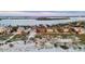 Beautiful waterfront houses line the coast offering scenic views of the ocean and surrounding landscape at 1058 Eldorado Ave, Clearwater Beach, FL 33767