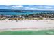 Expansive white sand beach with turquoise ocean waters in a beautiful coastal community at 1058 Eldorado Ave, Clearwater Beach, FL 33767