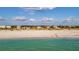 Beach view showing homes near the water and access to recreational activities and beautiful scenery at 1058 Eldorado Ave, Clearwater Beach, FL 33767