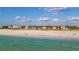Beautiful beach view showcasing the sandy shore and clear waters, ideal for swimming and recreation at 1058 Eldorado Ave, Clearwater Beach, FL 33767