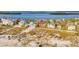 Panoramic beachfront view showcasing coastal homes and the serene waterfront at 1058 Eldorado Ave, Clearwater Beach, FL 33767