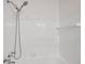 Clean, white tiled bathtub and shower with updated fixtures in the bathroom at 1069 21St N Ave, St Petersburg, FL 33704