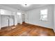 Bedroom featuring hardwood floors, laundry closet, and natural light at 1069 21St N Ave, St Petersburg, FL 33704