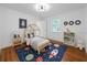 Adorable bedroom with playful decor, a unique bed frame, and ample space for fun at 1069 21St N Ave, St Petersburg, FL 33704