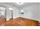 Cozy bedroom features hardwood floors and a window for natural light at 1069 21St N Ave, St Petersburg, FL 33704