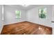 Bright bedroom with hardwood floors, neutral walls, and plenty of natural light at 1069 21St N Ave, St Petersburg, FL 33704