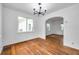 Dining room showcasing hardwood floors and arched entry at 1069 21St N Ave, St Petersburg, FL 33704