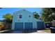 Garage featuring multiple doors and ample space for parking or storage at 1069 21St N Ave, St Petersburg, FL 33704