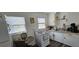 This kitchen is complete with bright white cabinets, an oven and updated appliances at 1069 21St N Ave, St Petersburg, FL 33704