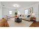 Bright and airy living room with hardwood floors, neutral decor, and ample natural light at 1069 21St N Ave, St Petersburg, FL 33704