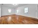 Spacious living room featuring wood floors and an abundance of natural light at 1069 21St N Ave, St Petersburg, FL 33704