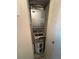 Utility closet features a water heater and HVAC system with a filter and plumbing at 107 Caldwell Dr # 178M, Brandon, FL 33510