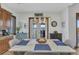 Bright dining area with a modern table, stylish chandelier, and water views at 107 Sunset Dr, Nokomis, FL 34275