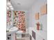 Bathroom with sink, vanity, colorful shower curtain, and modern decorations at 11015 S County Road 39, Lithia, FL 33547