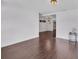 Spacious living room with dark hardwood floors and neutral walls at 11015 S County Road 39, Lithia, FL 33547