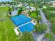 Aerial view of community tennis courts, basketball court, community pool, and a playground area at 11029 Winter Crest Dr Dr, Riverview, FL 33569