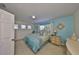 Cozy bedroom with natural light and a comfortable bed at 11029 Winter Crest Dr Dr, Riverview, FL 33569