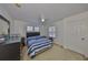 Well-lit bedroom featuring a ceiling fan and closet at 11029 Winter Crest Dr Dr, Riverview, FL 33569