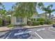 A view of the exterior of the building with visitor parking in front at 11029 Winter Crest Dr Dr, Riverview, FL 33569