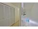 Hallway featuring large closet and stairway leading to the first floor at 11029 Winter Crest Dr Dr, Riverview, FL 33569