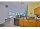 Functional kitchen with stainless steel appliances and plenty of counter space with tile flooring at 11029 Winter Crest Dr Dr, Riverview, FL 33569