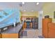 The kitchen has a breakfast bar, wooden cabinets and stainless steel appliances at 11029 Winter Crest Dr Dr, Riverview, FL 33569