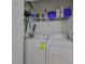 Neat and clean laundry room with washer, dryer and storage at 11029 Winter Crest Dr Dr, Riverview, FL 33569