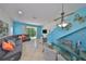 Living room with a modern couch, table, and bright colors at 11029 Winter Crest Dr Dr, Riverview, FL 33569