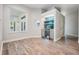 Sitting area features a built-in beverage center and bright natural light at 1119 Hounds Run, Safety Harbor, FL 34695