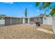 Home's backyard features stone landscaping with a patio and outdoor grill at 1120 45Th N St, St Petersburg, FL 33713