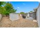 Home's backyard features stone landscaping with a patio and outdoor grill at 1120 45Th N St, St Petersburg, FL 33713