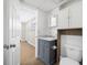 Bathroom featuring vanity, overhead storage, and step-in shower at 1120 45Th N St, St Petersburg, FL 33713