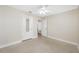 Bedroom featuring a ceiling fan and closet with mirrored doors at 1120 45Th N St, St Petersburg, FL 33713