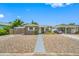 Well-maintained home with neutral paint and gravel landscaping, offering curb appeal and low maintenance at 1120 45Th N St, St Petersburg, FL 33713