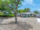Charming single-story home featuring a well-manicured front yard and convenient driveway parking at 1120 45Th N St, St Petersburg, FL 33713