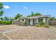 Charming single-story home with gray exterior, white trim, and fresh rock landscaping at 1120 45Th N St, St Petersburg, FL 33713