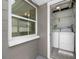 Indoor laundry room with washer and dryer; natural light from the exterior window at 1120 45Th N St, St Petersburg, FL 33713