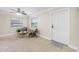 Inviting living room with neutral paint, two windows and ceiling fan at 1120 45Th N St, St Petersburg, FL 33713