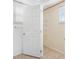 Walk-in closet with tile flooring, built-in shelving and a window offering natural light at 1120 45Th N St, St Petersburg, FL 33713