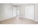 Simple bedroom with double closet, tile floor and natural light at 11226 Thicket Ct, Tampa, FL 33624