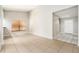 Inviting living room with ample natural light, tile flooring, and convenient access to other rooms at 11226 Thicket Ct, Tampa, FL 33624